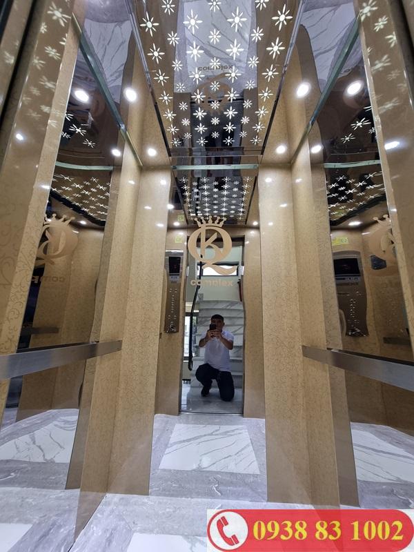 cabin thang máy laminate hoa văn